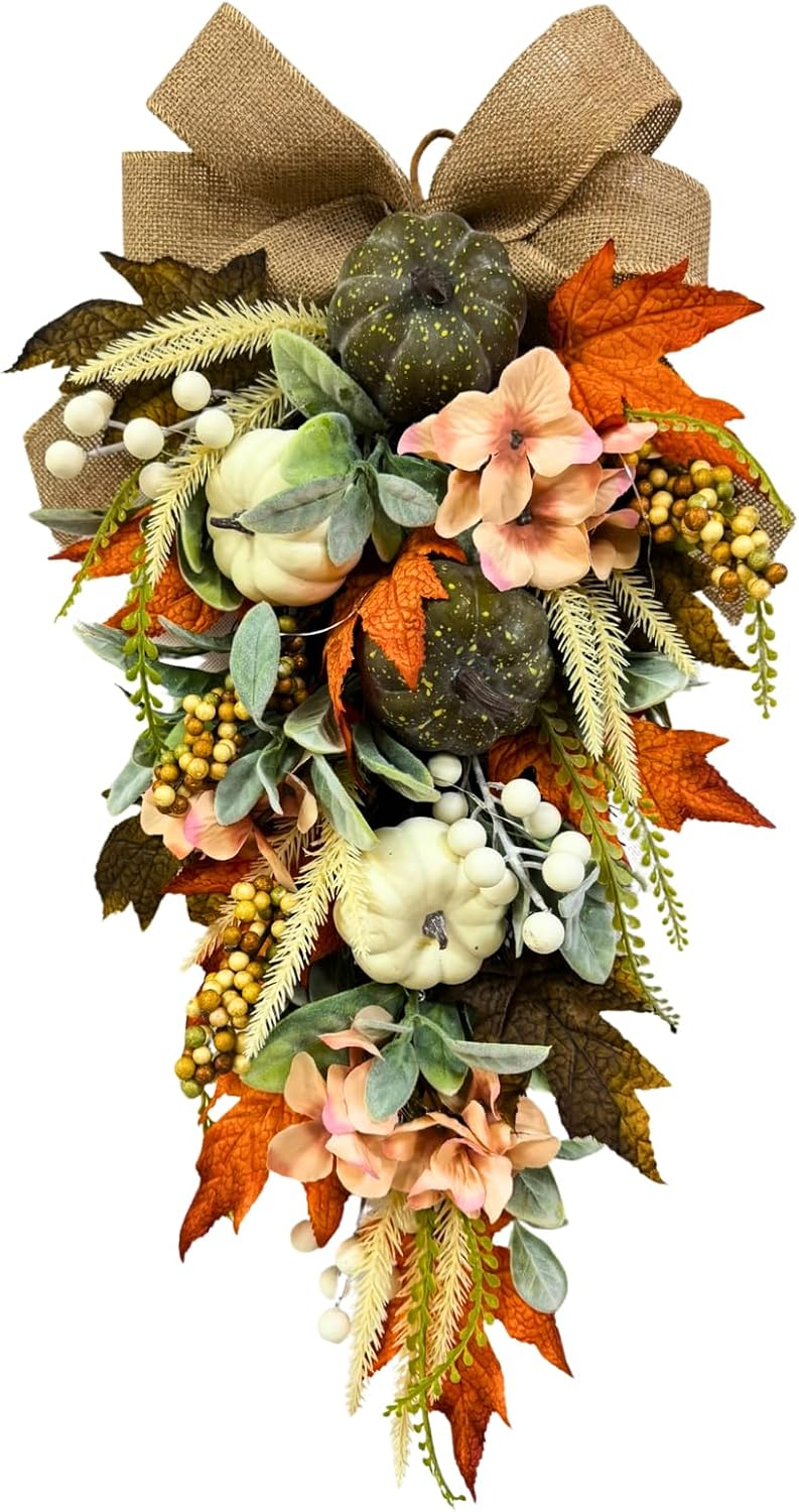 Lighted fall teardrop swag with white and green pumpkins, peach flowers, berries, leaves, and burlap bow